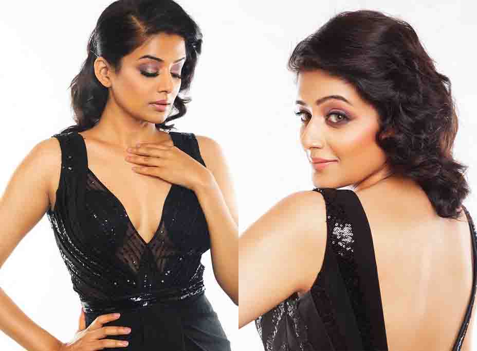 Priyamani’s New hot photoshoot in deep neck black outfit